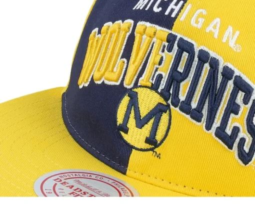 Michigan Wolverines Pinwheel Of Fortune Yellow/Navy Snapback - Mitchell & Ness